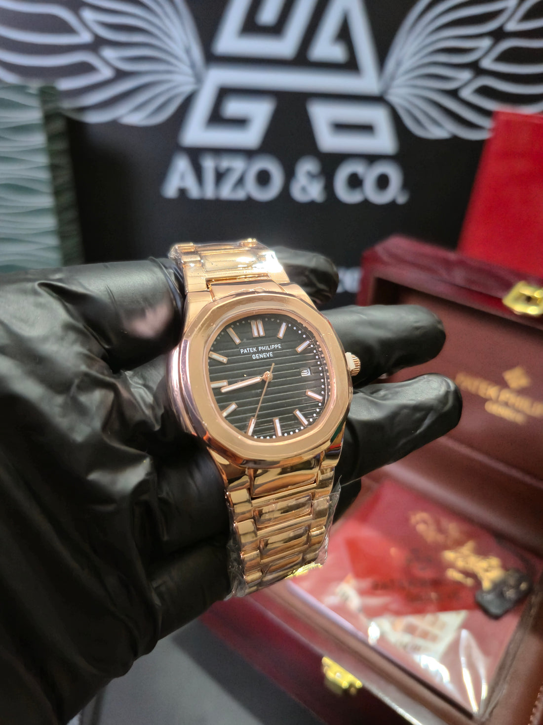 PP Nautilus – Gold Chain with Black Dial