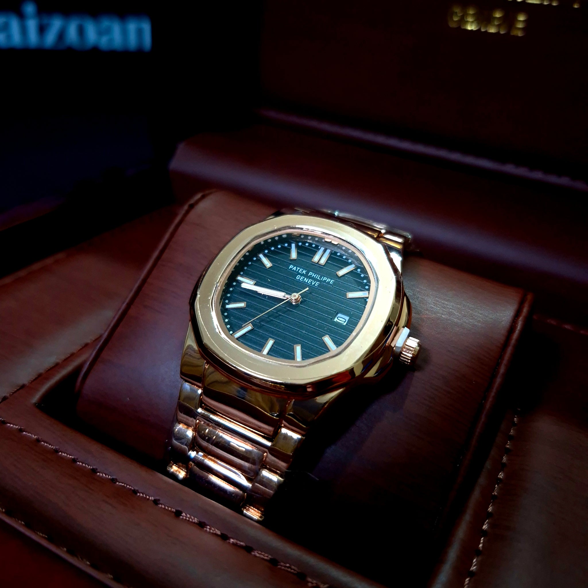PP Nautilus – Gold Chain with Black Dial